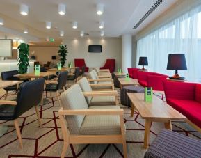 Lounge and coworking space at Hampton By Hilton London Gatwick Airport.