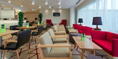 Lounge and coworking space at Hampton By Hilton London Gatwick Airport.