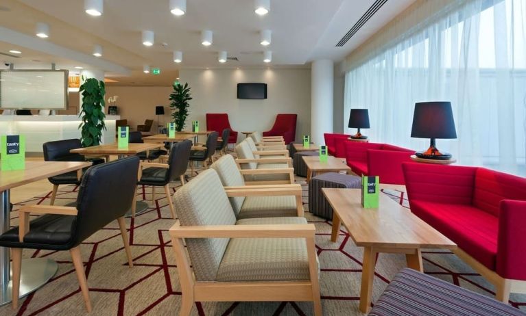 Lounge and coworking space at Hampton By Hilton London Gatwick Airport.