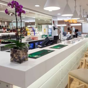 Coworking space and bar at Hampton By Hilton London Gatwick Airport.