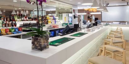 Coworking space and bar at Hampton By Hilton London Gatwick Airport.