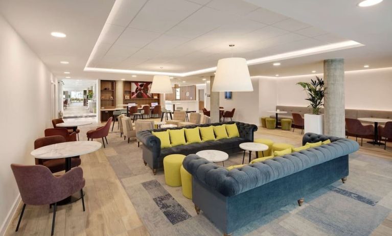 Coworking space and lounge at Hampton By Hilton London Stansted Airport.