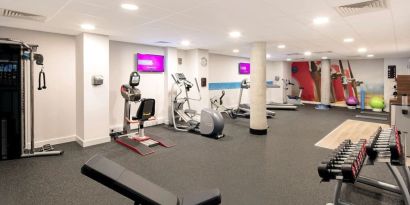 Fitness center at Hampton By Hilton London Stansted Airport.