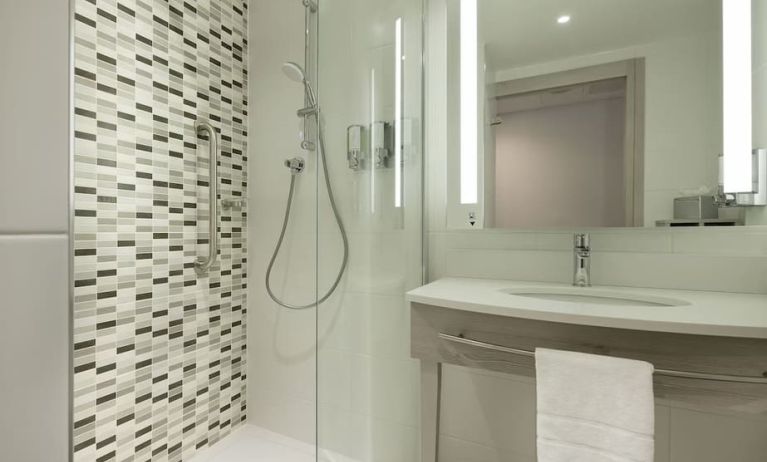 Guest bathroom with shower at Hampton By Hilton Leeds City Centre.