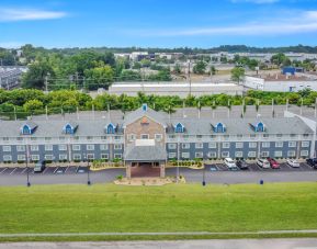 Hotel exterior by day at Comfort Inn & Suites Nashville.