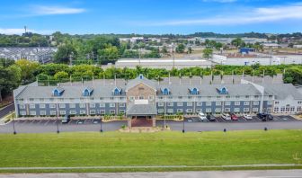 Hotel exterior by day at Comfort Inn & Suites Nashville.