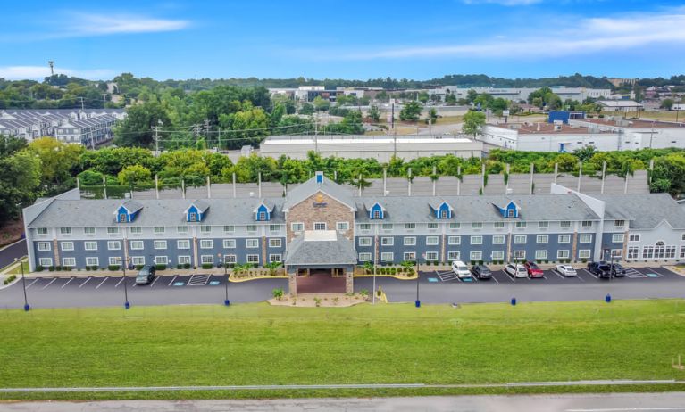 Hotel exterior by day at Comfort Inn & Suites Nashville.