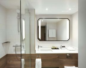 Guest bathroom with shower at Hilton Cobham.