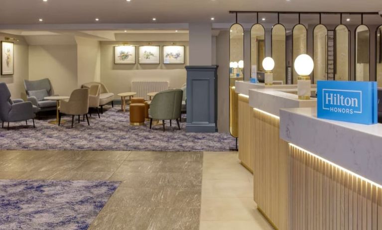 Lobby and coworking lounge at Hilton Cobham.