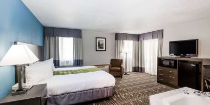 King room with natural light at Baymont By Wyndham Pella.