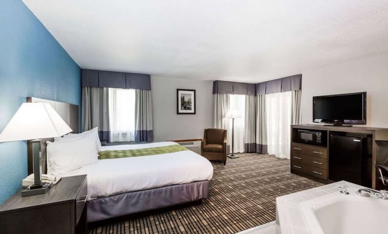 King room with natural light at Baymont By Wyndham Pella.