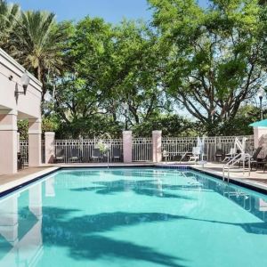 Refreshing outdoor pool at DoubleTree By Hilton Sunrise.