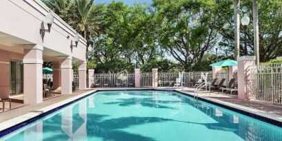 Refreshing outdoor pool at DoubleTree By Hilton Sunrise.