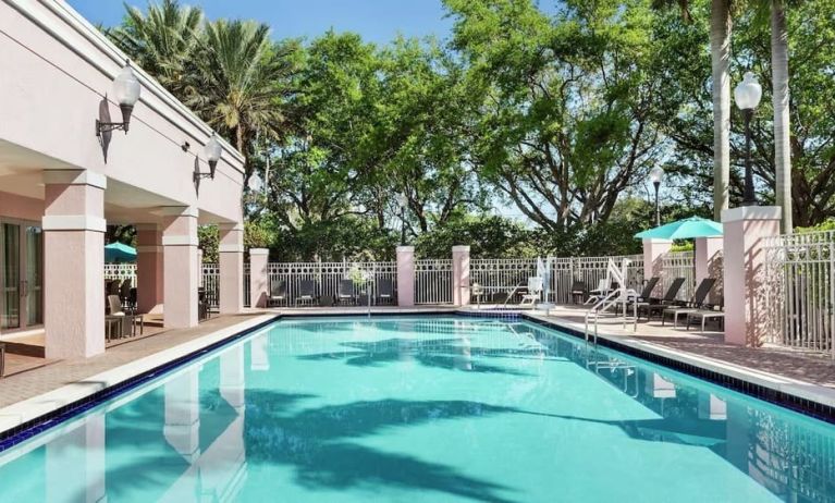 Refreshing outdoor pool at DoubleTree By Hilton Sunrise.