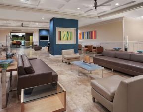 Lobby and coworking lounge at DoubleTree By Hilton Sunrise.