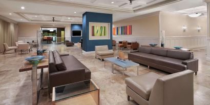 Lobby and coworking lounge at DoubleTree By Hilton Sunrise.