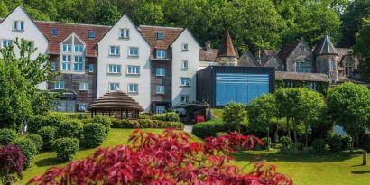 Hotel exterior with serene view at DoubleTree By Hilton Bristol South - Cadbury House.