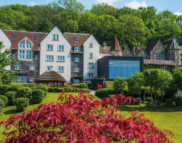 Hotel exterior with serene view at DoubleTree By Hilton Bristol South - Cadbury House.