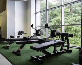 Well equipped fitness center with a view at DoubleTree By Hilton Bristol South - Cadbury House.