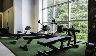 Well equipped fitness center with a view at DoubleTree By Hilton Bristol South - Cadbury House.