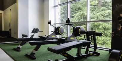 Well equipped fitness center with a view at DoubleTree By Hilton Bristol South - Cadbury House.