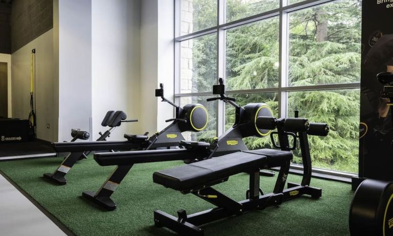 Well equipped fitness center with a view at DoubleTree By Hilton Bristol South - Cadbury House.