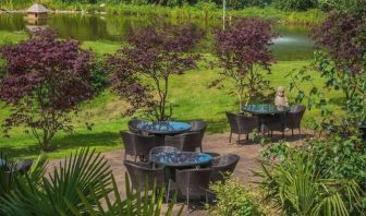 Outdoor seating and natural scenery at DoubleTree By Hilton Bristol South - Cadbury House.