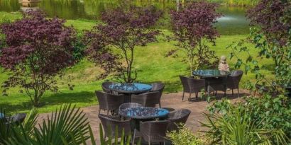 Outdoor seating and natural scenery at DoubleTree By Hilton Bristol South - Cadbury House.