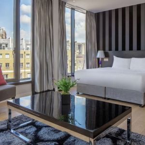 Spacious king suite with city views at DoubleTree by Hilton London Greenwich.