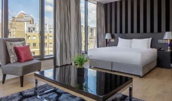 Spacious king suite with city views at DoubleTree by Hilton London Greenwich.