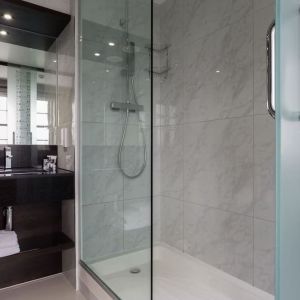 Guest bathroom with shower at DoubleTree by Hilton London Greenwich.