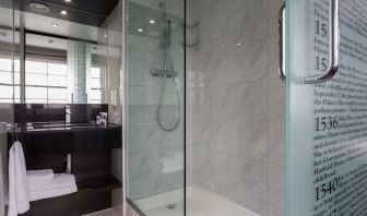 Guest bathroom with shower at DoubleTree by Hilton London Greenwich.