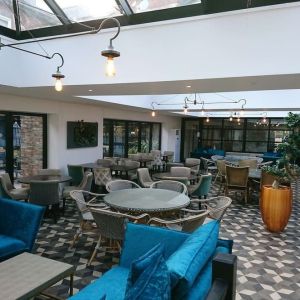 Spacious dining area with natural light at DoubleTree By Hilton York.