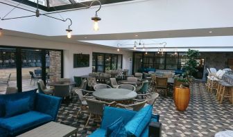 Spacious dining area with natural light at DoubleTree By Hilton York.