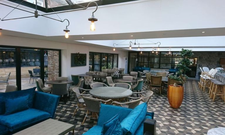 Spacious dining area with natural light at DoubleTree By Hilton York.