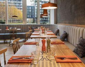 Spacious dining area perfect for coworking at Lincoln Plaza London, Curio Collection By Hilton.