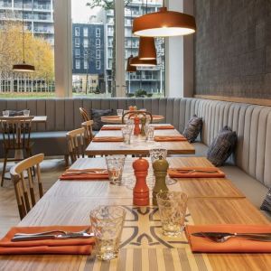 Spacious dining area perfect for coworking at Lincoln Plaza London, Curio Collection By Hilton.