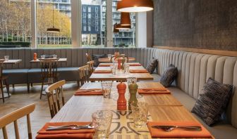 Spacious dining area perfect for coworking at Lincoln Plaza London, Curio Collection By Hilton.