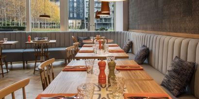 Spacious dining area perfect for coworking at Lincoln Plaza London, Curio Collection By Hilton.