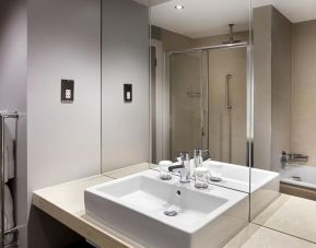 Guest bathroom with shower at Doubletree by Hilton Glasgow Central.