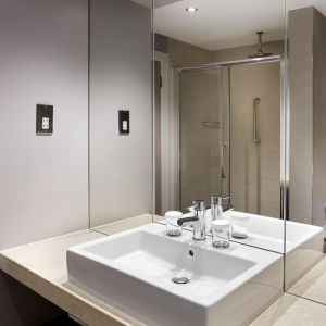 Guest bathroom with shower at Doubletree by Hilton Glasgow Central.