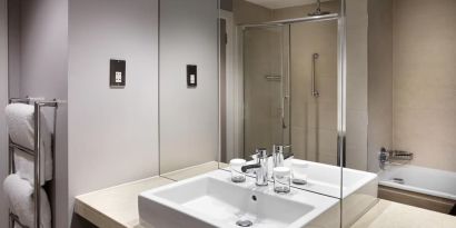 Guest bathroom with shower at Doubletree by Hilton Glasgow Central.