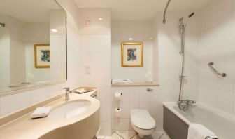 Guest bathroom with shower at Doubletree by Hilton Glasgow Strathclyde. 