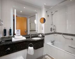 Guest bathroom with shower at DoubleTree by Hilton Swindon.