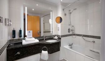 Guest bathroom with shower at DoubleTree by Hilton Swindon.