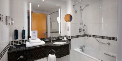 Guest bathroom with shower at DoubleTree by Hilton Swindon.