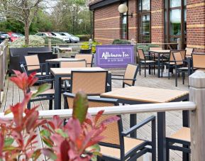 Hotel bar with outdoor seating at DoubleTree by Hilton Swindon.