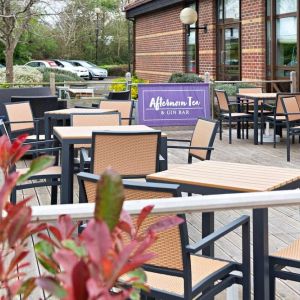 Hotel bar with outdoor seating at DoubleTree by Hilton Swindon.