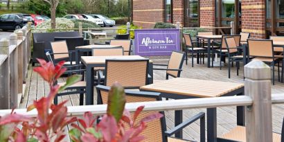 Hotel bar with outdoor seating at DoubleTree by Hilton Swindon.