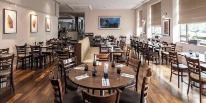 Dining area perfect for coworking at DoubleTree by Hilton Swindon.